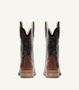 Custom brown cowboy boot with embossed black floral leather upper - side view