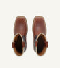 Custom brown cowboy boot with embossed black floral leather upper - side view